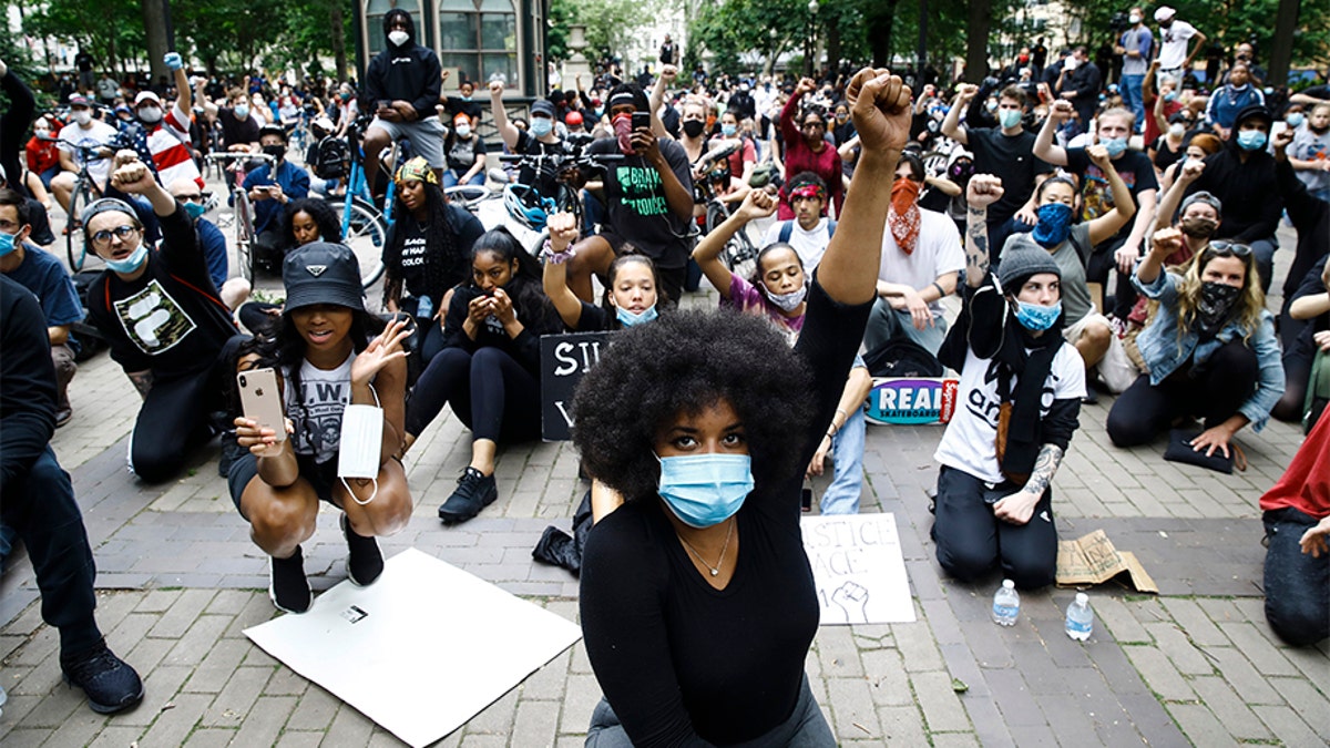 Demonstrators chant Tuesday, June 2, 2020, at Rittenhouse Square in Philadelphia, during a protest over the death of George Floyd, who died May 25 after he was restrained by Minneapolis police.