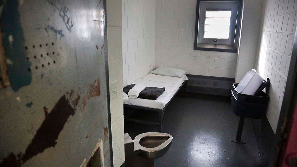 Photo shows interior of Rikers Island Jail cell