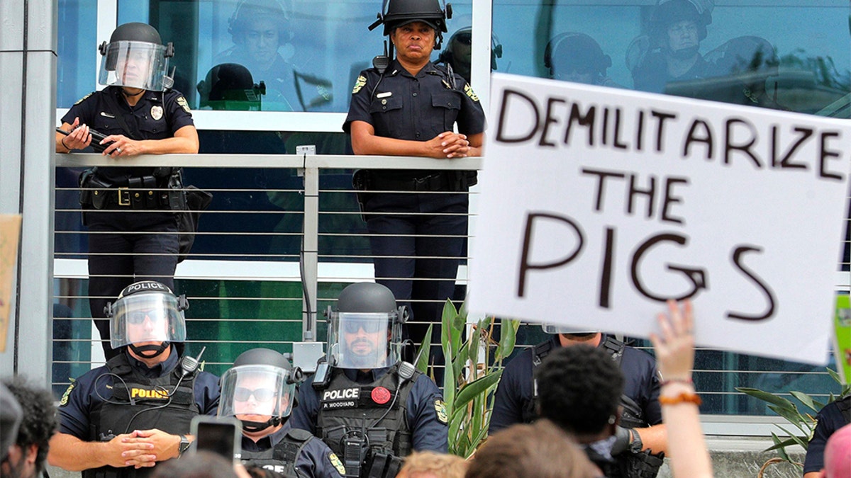 Protestors chanting in front of the Orlando Police Department this past Friday. (Joe Burbank/Orlando Sentinel via AP)