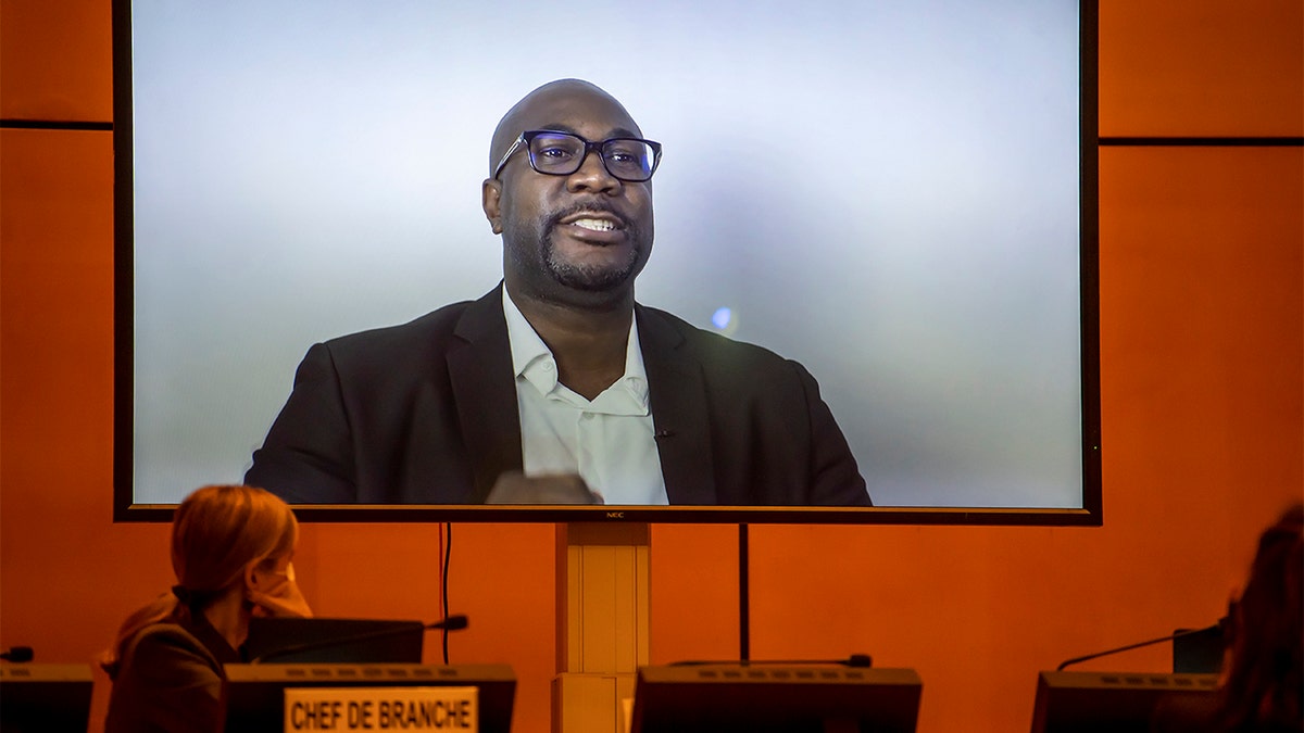 Philonise Floyd, left, brother of George Floyd speaks (via video message) at the Human Rights Council of the United Nations in Geneva, Switzerland, Wednesday, June 17, 2020 during an urgent debate on current racially inspired human rights violations, systematic racism, police brutality against people of African descent and violence against peaceful protests. (Martial Trezzini/Keystone via AP, Pool)