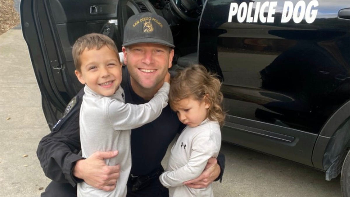 San Diego Police Department K9 Officer Jonathan Wiese with his own young son and daughter. (San Diego Police Department) 