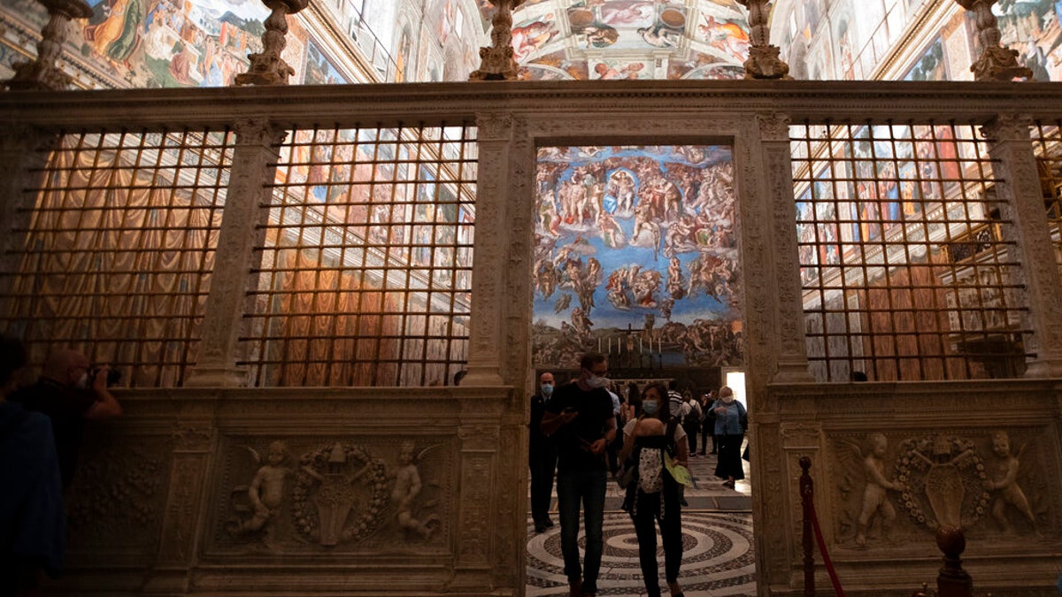 Officials were reportedly capping the number of visitors inside the Sistine Chapel to about 25 at a time.