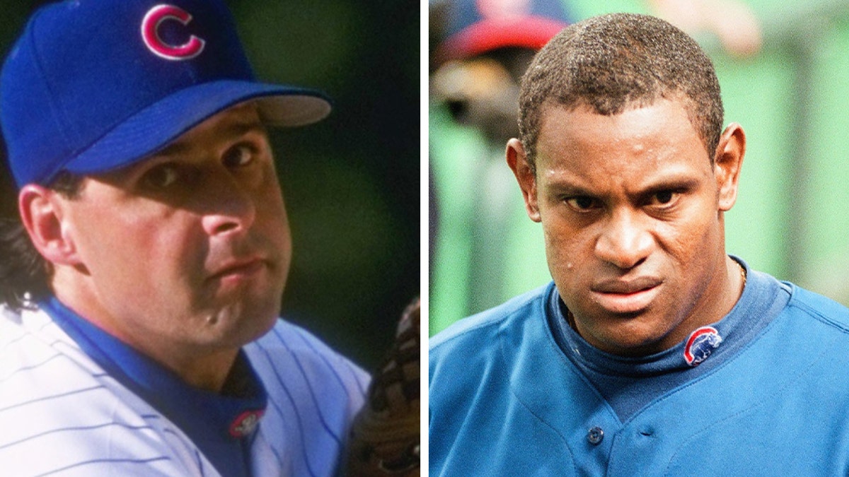 Chicago Cubs Sammy Sosa (R) is congratulated by teammates Mark