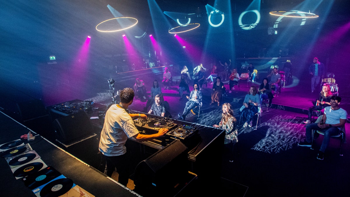 Amid the pandemic, clubbers attend the first "social dis-dancing" event in Nijmegen, Netherlands on June 6.