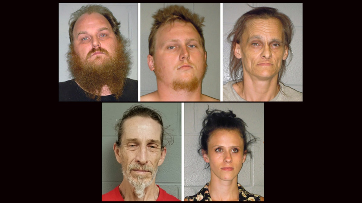 This combination of undated booking photos from the Shenandoah County (Virginia) Sheriff's Office shows from left to right, Donny Salyers, Dennis Salyers, Farrah Salyers, Christopher Sharp and Amanda Salyers. (Shenandoah County Sheriff's Office via AP)