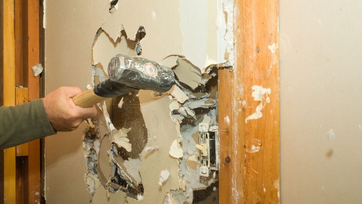 Renovating Wall, Removing Drywall with a Sledgehammer