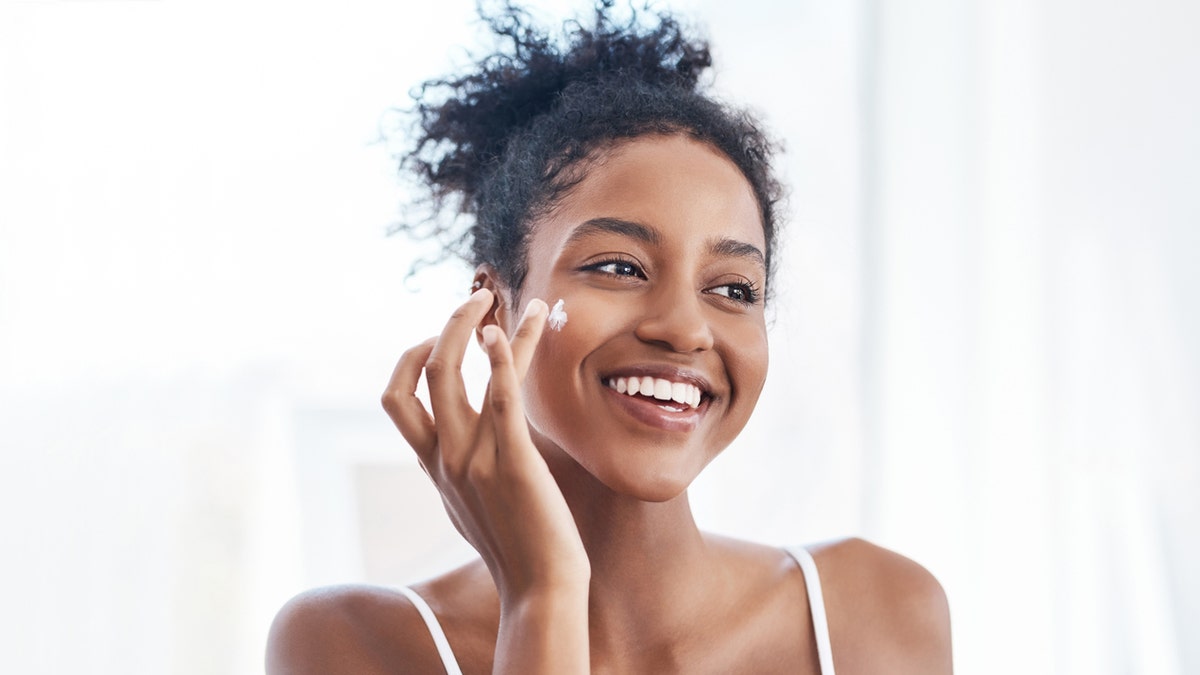 Moisturizing creams can improve the skin barrier and minimize irritation from face masks, experts say. (iStock)