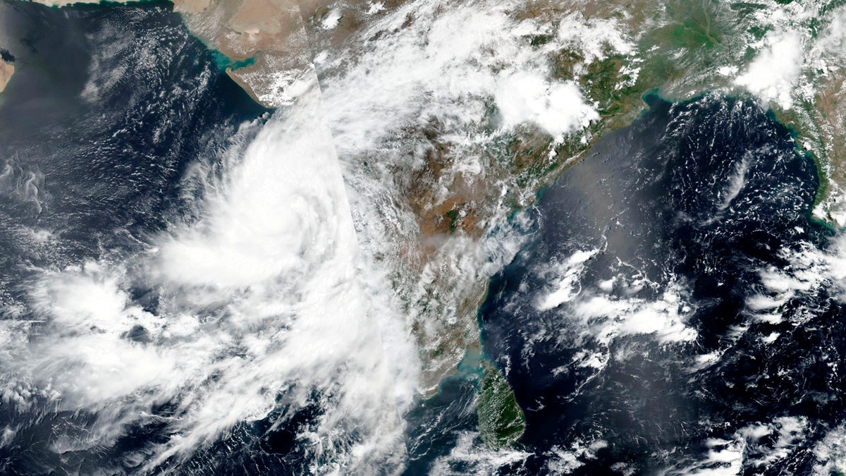 This June 2, satellite image released by NASA shows Cyclone Nisarga roaring toward the western coast of India.