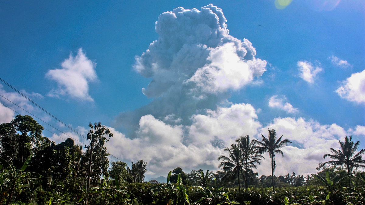 Mount Merapi spews volcanic materials during an eruption as seen from Sleman, Indonesia, Sunday, June 21, 2020.