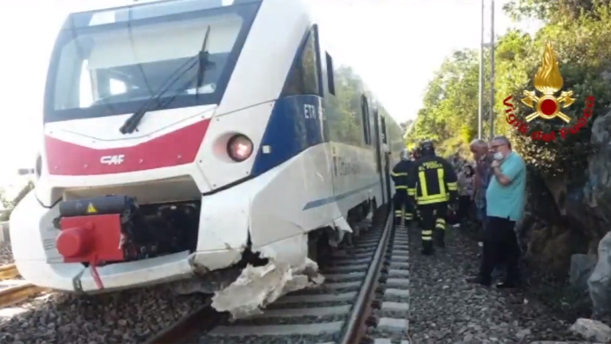 A commuter train in Italy derailed after striking boulders on the tracks after a landslide on Monday.