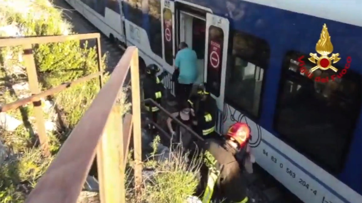 A commuter train in Italy derailed after striking boulders on the tracks after a landslide on Monday.