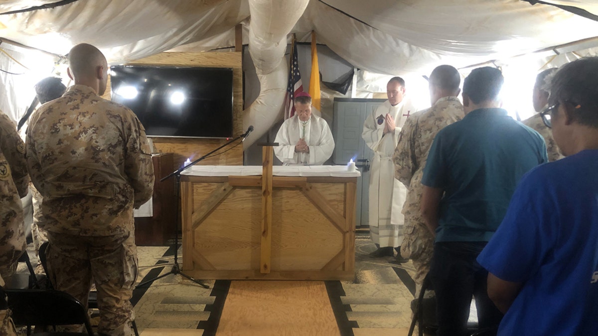 Archbishop Timothy Broglio, Archbishop of U.S. Military Services, celebrates Mass with U.S. and Italian service members deployed to Nigerien Air Base 101 in Niamey, Niger, Nov. 3, 2019. (Courtesy Photo)