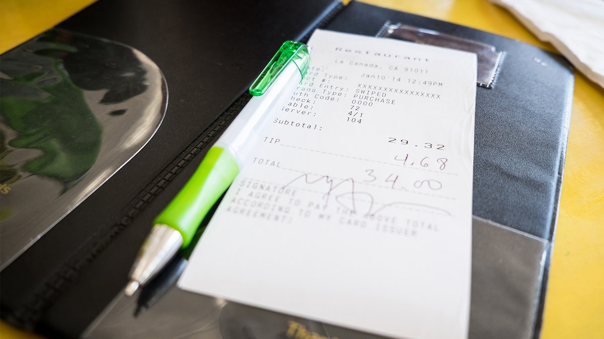 “At first I was feeling kind of uneasy about it because I really didn’t know what to do, this has really never happened to me before,” customer Shikera Burns said of her initial shock at finding the derogatory word on her receipt.