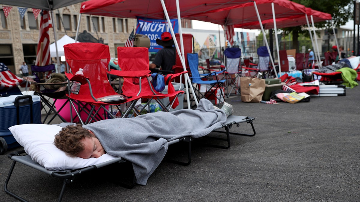 June 19: Supporters of President Trump sleep in the early morning while lined up to attend the Trump campaign rally near the BOK Center, in Tulsa, Oklahoma. (Photo by Win McNamee/Getty Images)