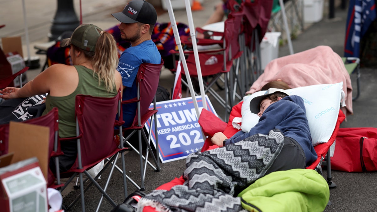 June 19: Supporters of President Trump sleep in the early morning while lined up to attend the Trump campaign rally near the BOK Center, in Tulsa, Oklahoma. (Photo by Win McNamee/Getty Images)
