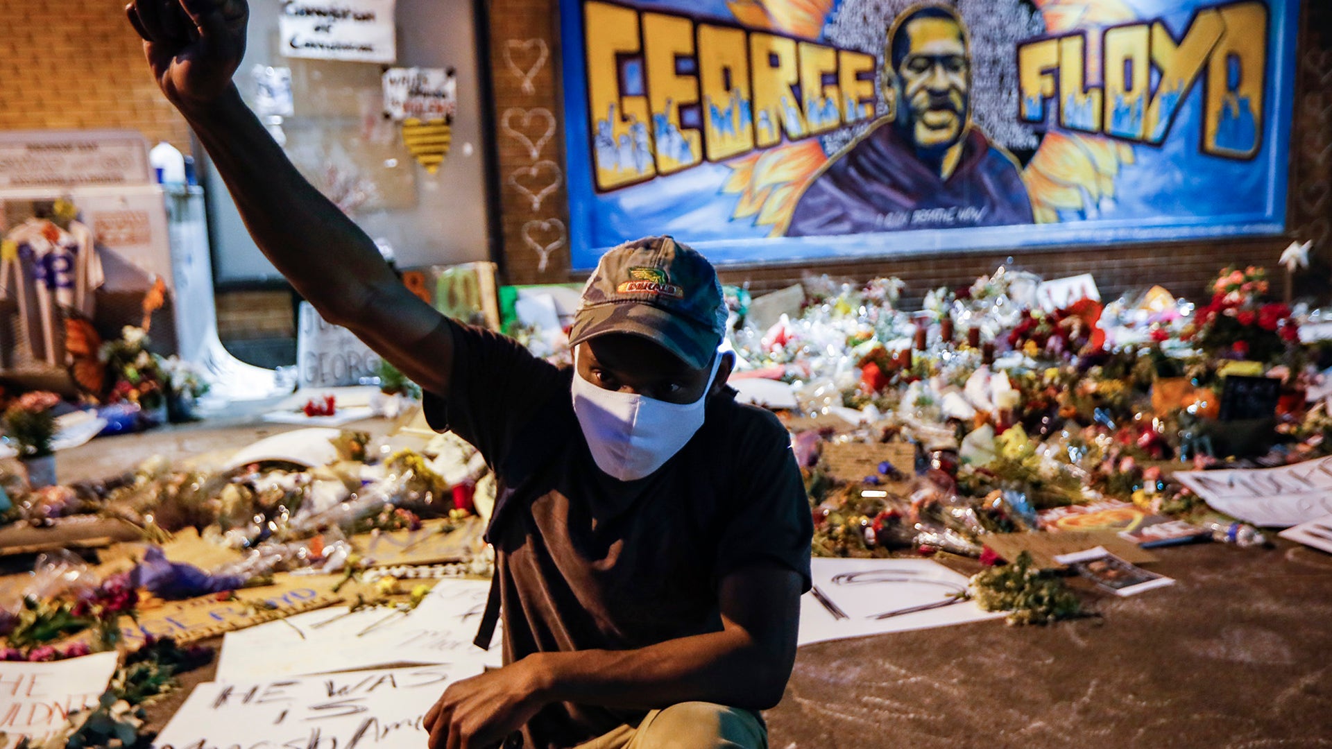 Protesters gather at a memorial for George Floyd where he died outside Cup Foods on East 38th Street and Chicago Avenue in Minneapolis, June 1, 2020.