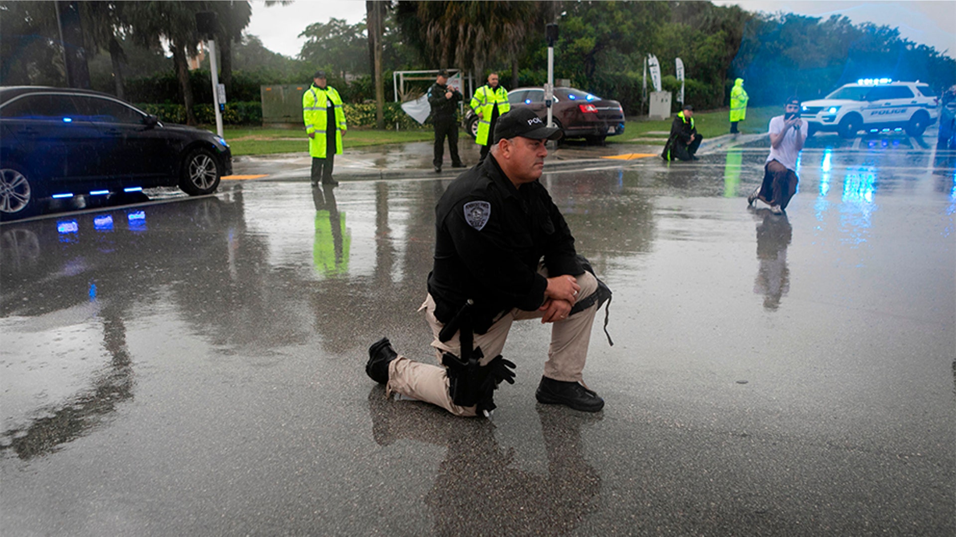 A police officer kneeling during a protest against police brutality in Sunrise, Fla., on June 2.