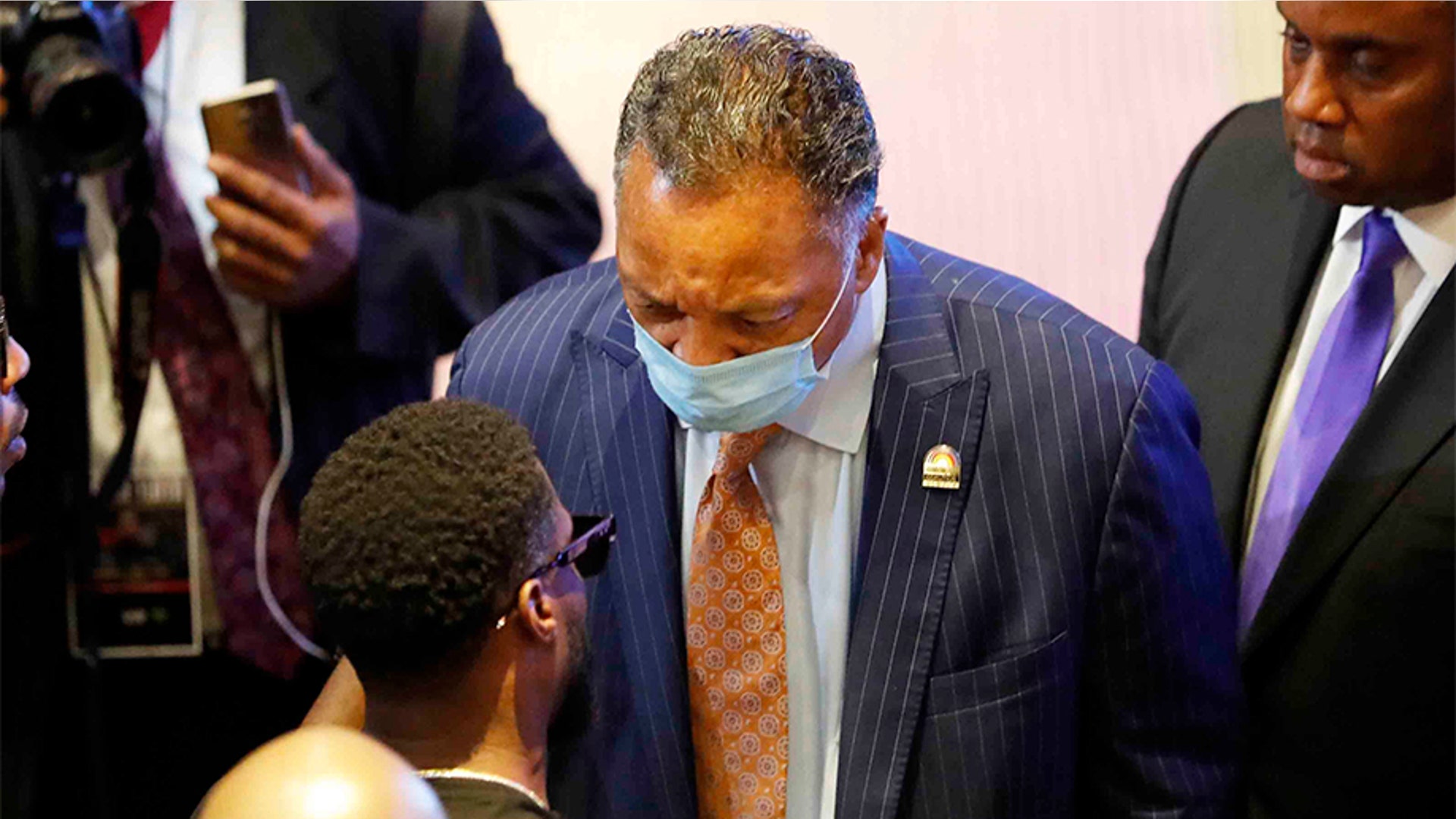 The Rev. Jesse Jackson mingling with others in the Frank J. Lindquist Sanctuary at North Central University.