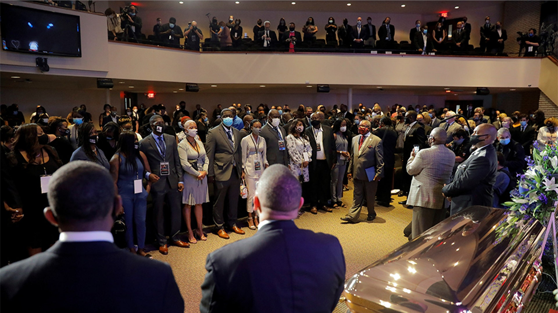 People at the beginning of the memorial service for George Floyd.