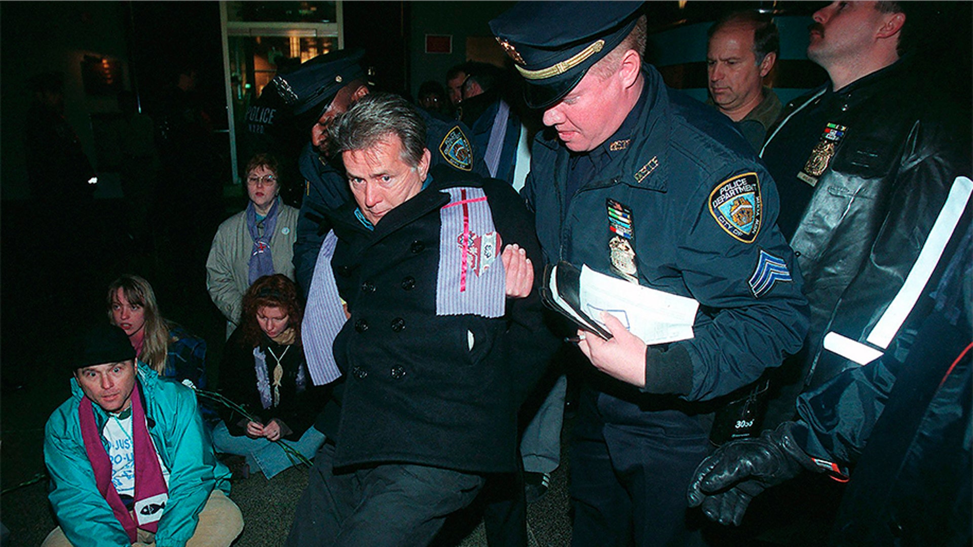 Actor Martin Sheen being arrested by New York City police at a nonviolent civil-disobedience event at the Riverside Research Institute on April 5, 1996, in New York. Sheen, along with a group of participants from the Way of the Cross Walk, aimed to call attention to the struggle for a world free of nuclear weapons.