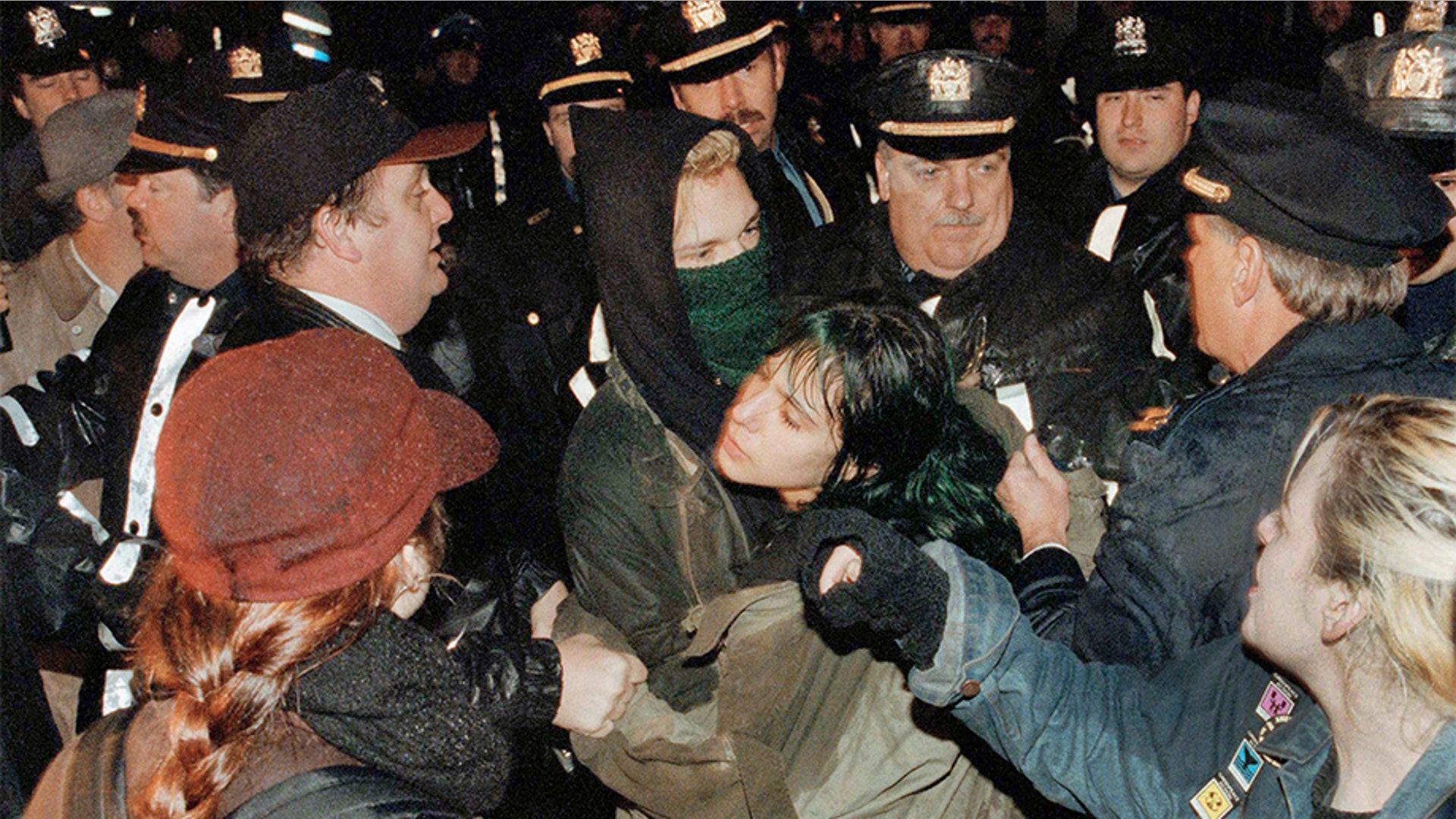 New York City police grappling with anti-war protesters outside a hotel on Feb. 6, 1991, where then-President George H.W. Bush was addressing the Economic Club of New York.