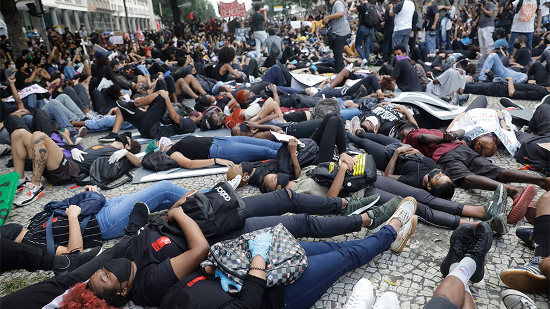 Demonstrators protesting against racism and hate crimes in Rio de Janeiro, Brazil.