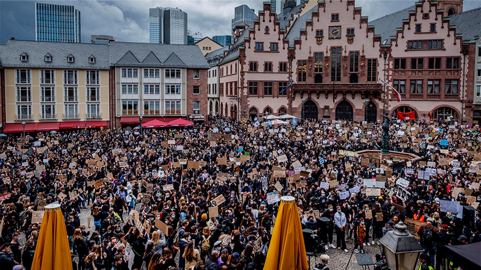Hundreds of people attending a rally in Frankfurt, Germany. 