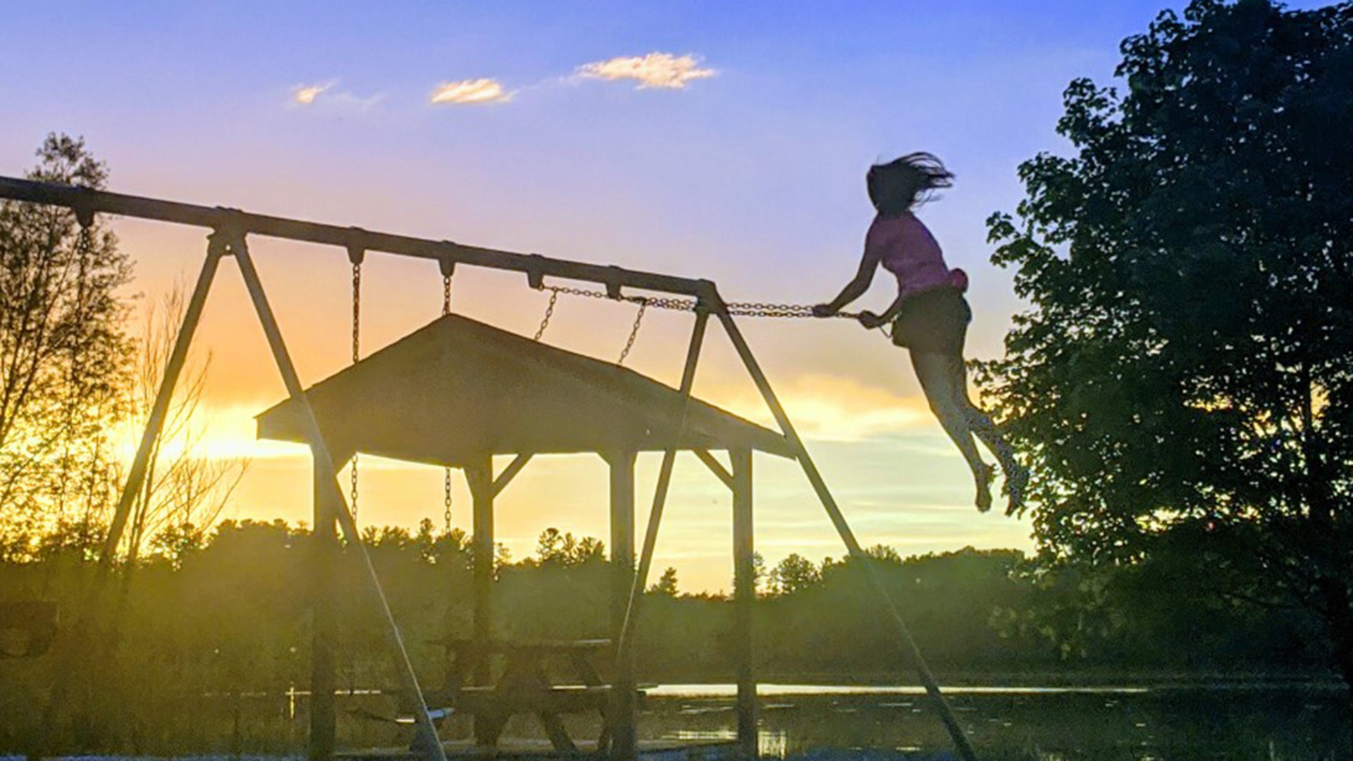 Daughter enjoying Upper Michigan parks being open. In a world that seems broken... finding the light 😊 Photo at Crystal Lake Park in Iron Mountain, MI. Lily Villringer in the Upper Peninsula