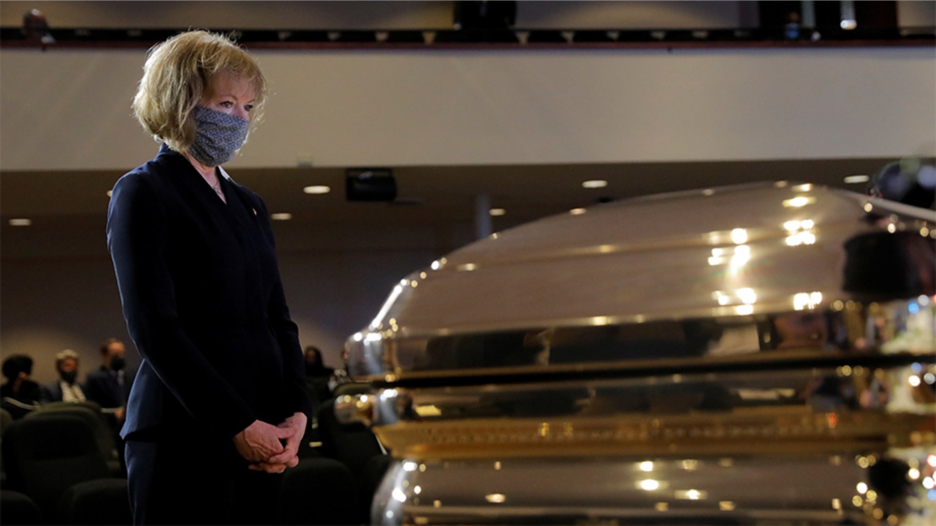 Sen. Tina Smith paying her respects.