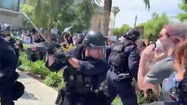 Video shot by actor shows LAPD officers seen striking protesters with batons