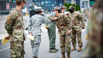 Army to stop using photos on officers' records, citing racial bias concerns