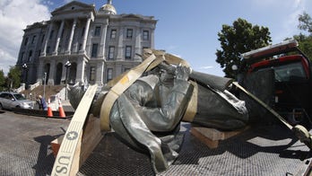Colorado police arrest 3 after Civil War statue pedestal is set on fire