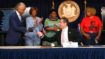 Cuomo signs police reform bill; NYPD union warns cops will be ‘unable to do the job’