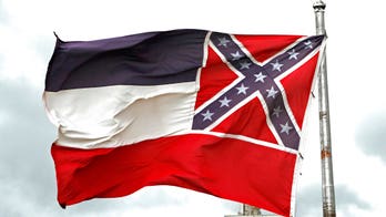 Mississippi governor signs bill retiring last state flag with Confederate battle emblem