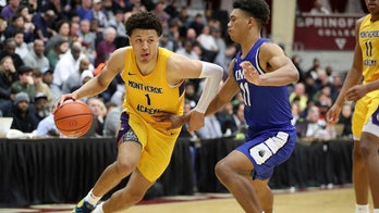 Oklahoma State's Cunningham staying despite postseason ban