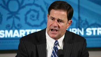 Arizona Gov. Ducey says public should wear coronavirus masks after heated statewide debate