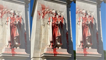 Trump says government is ‘tracking down the two anarchists’ who threw paint on Washington statue