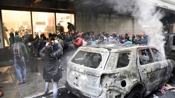 Seattle-area man linked to removal of M4 rifle from torched police vehicle: reports