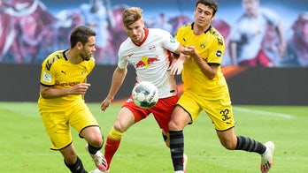 US youngster Reyna sets up goal on 1st start for Dortmund