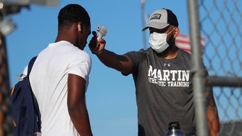 High schools push ahead for fall football amid pandemic