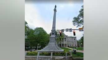 North Carolina removes Confederate statue's pillar near Statehouse after 125 years