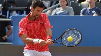Virus cases at Djokovic's event put sports under scrutiny