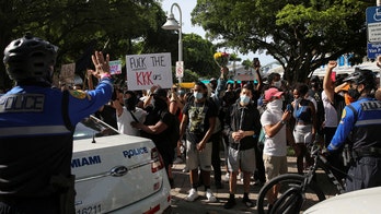Florida doctors aren't asking coronavirus patients if they took part in protests, health official says