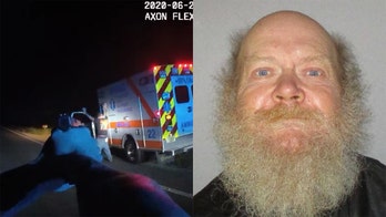 Florida ambulance-theft suspect chased down, arrested at gunpoint, police video shows