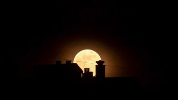 Stunning strawberry moon thrills skywatchers
