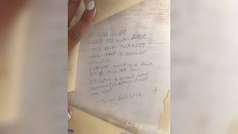 Woman finds decades-old message hidden behind her wallpaper