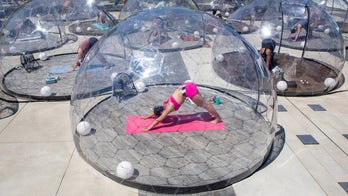Yoga pop-up in Toronto puts each individual person inside a geodesic dome