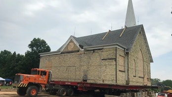 121-year-old Wisconsin church moves on wheels to new location