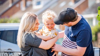 Heartwarming photos show mom, dad hugging son for first time after 3 month separation because of coronavirus