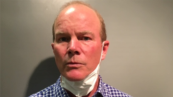 Maryland police arrest, charge cyclist seen in video confronting youth over George Floyd flyers